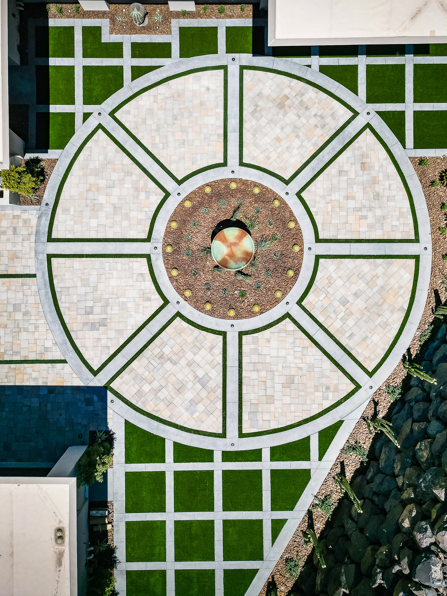 Top-down view of a circular landscaped courtyard
