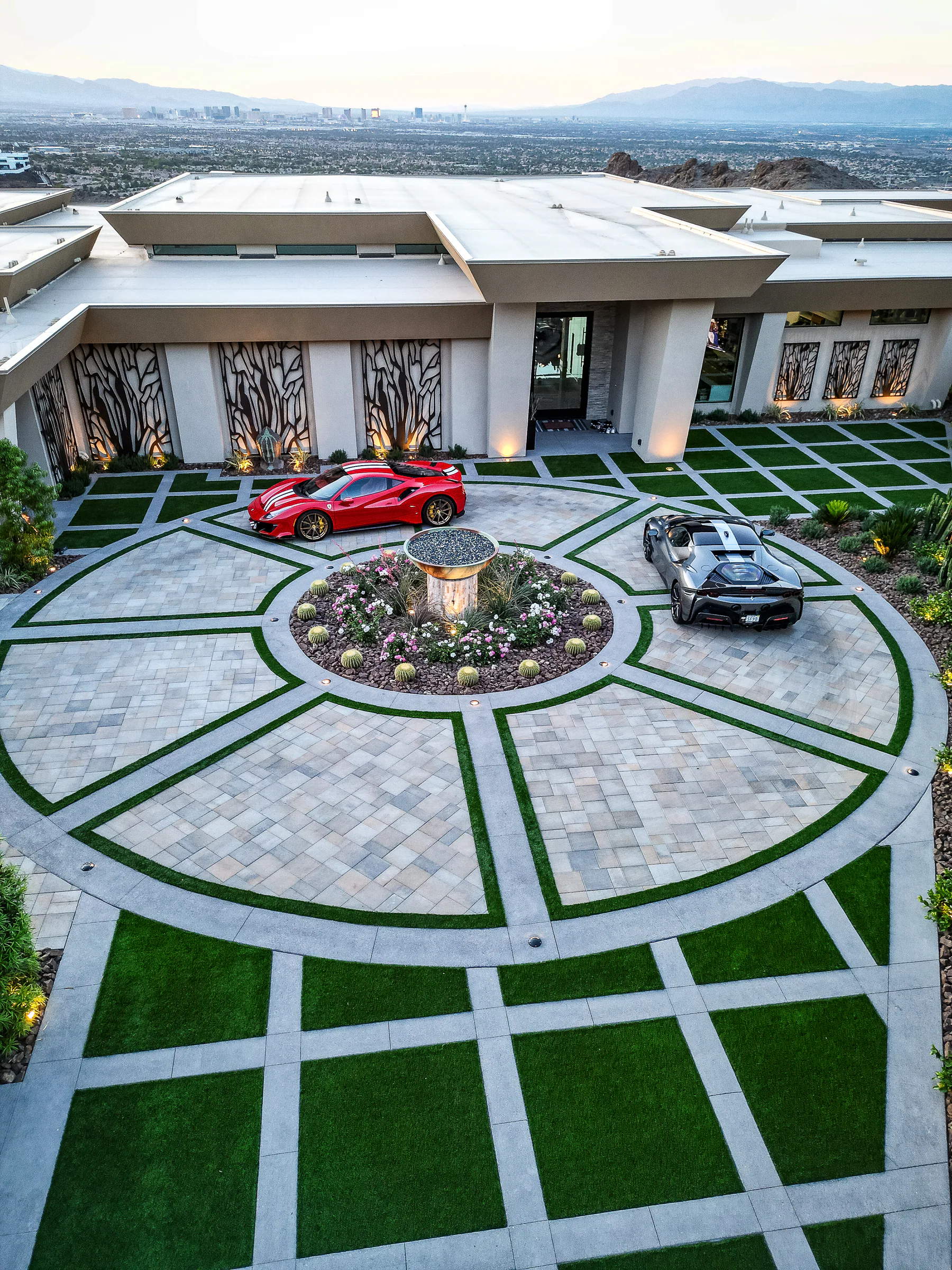 Toti project showing drone aerial circular motor court supercars